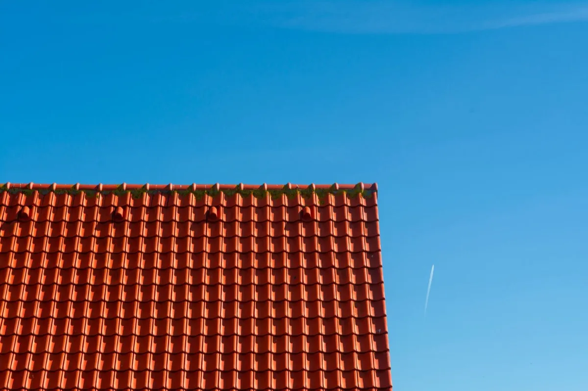 Tile roof gable in full sun, the kind of exposure that sets roof life in Hollywood, FL